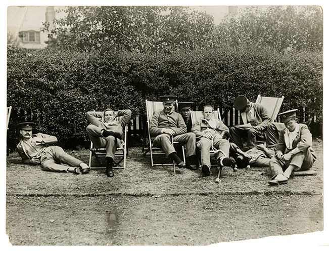Photograph of wounded servicemen resting in deckchairs