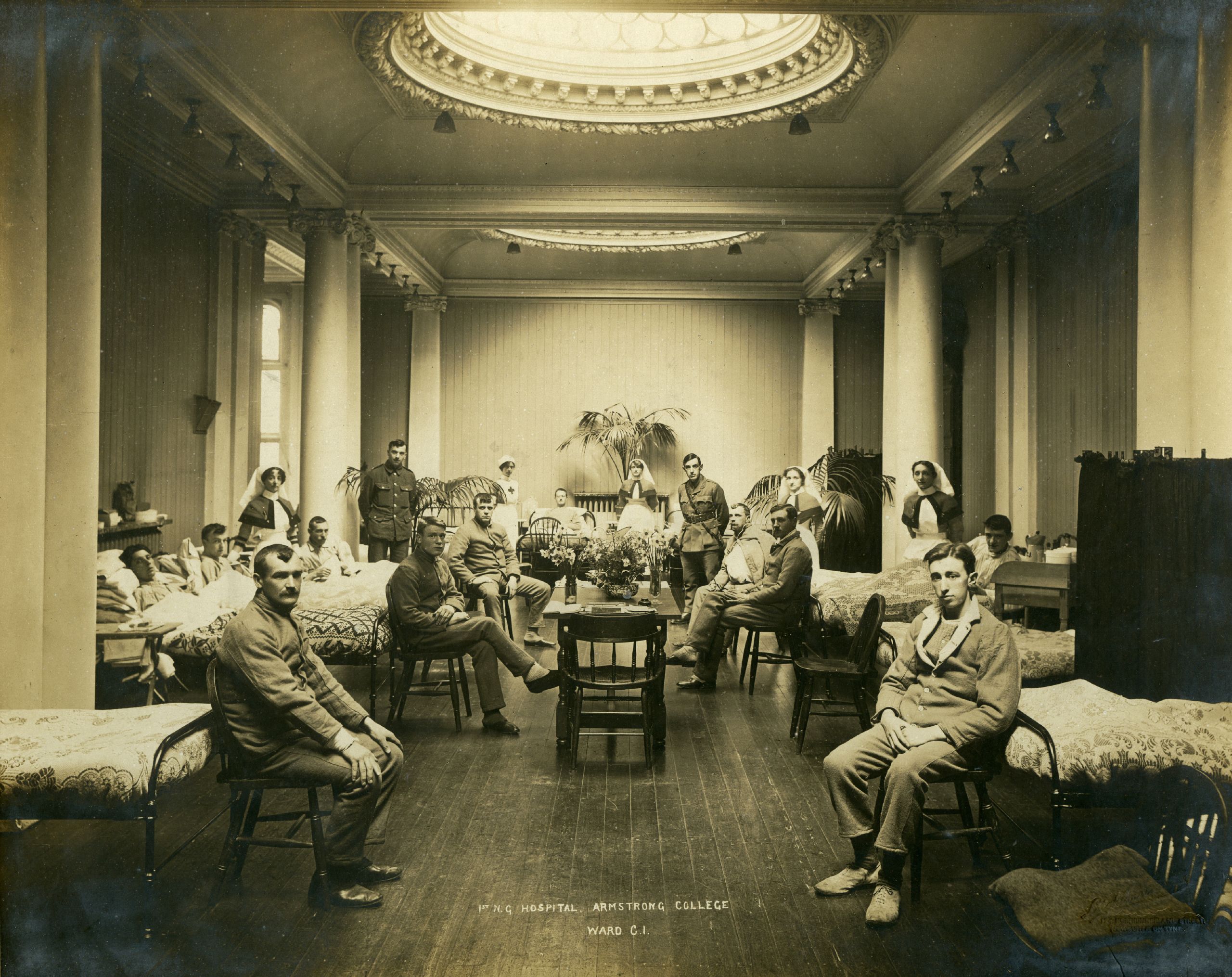 Photograph of wounded servicemen and staff on Ward C1 of the First Northern General Hospital