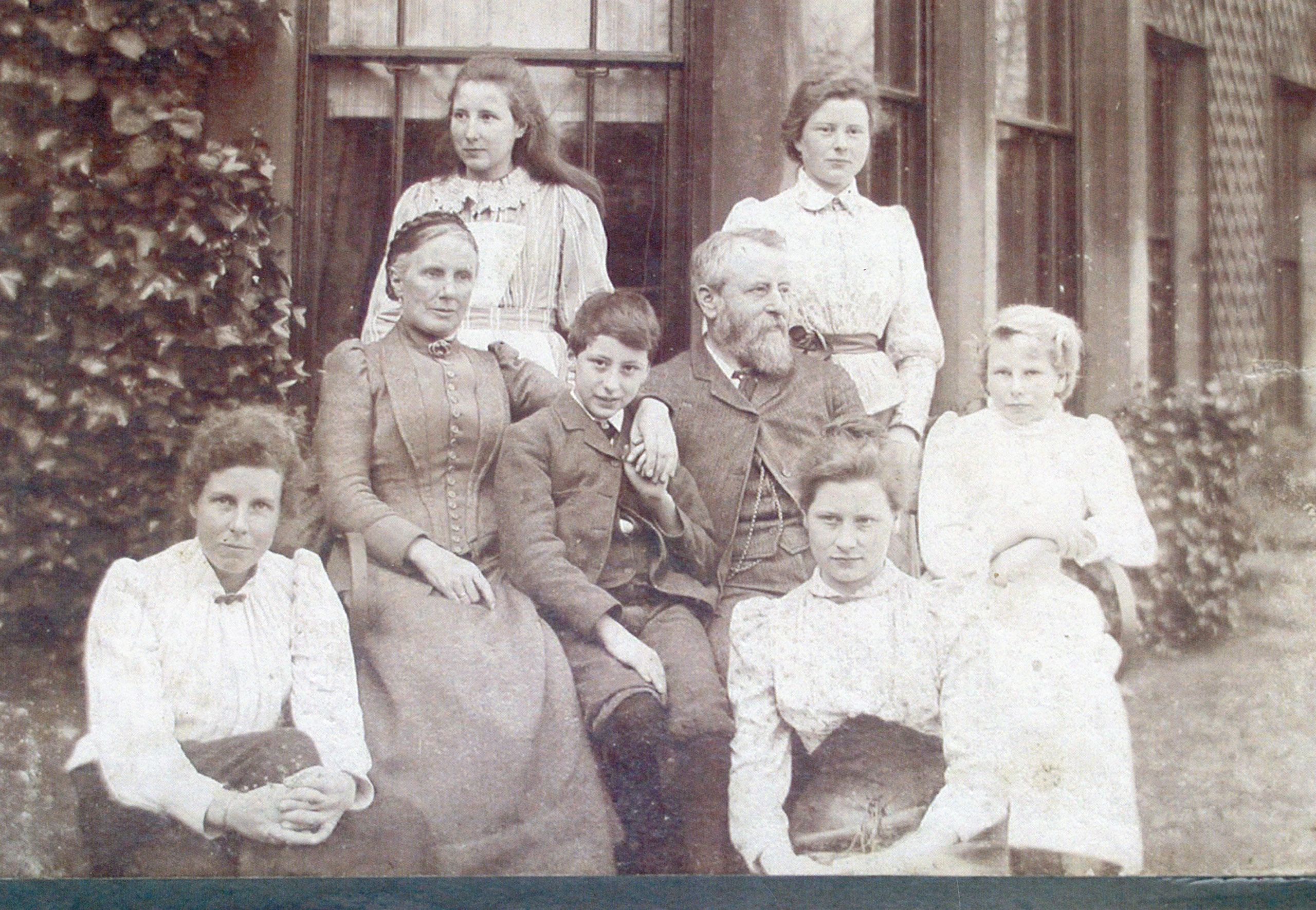 Black and white photograph of Elizabeth (pictured second left), her husband Robert Spence Watson and their six children: Mabel, Ruth, Evelyn, Mary, Bertha and Arnold (1890-2003)