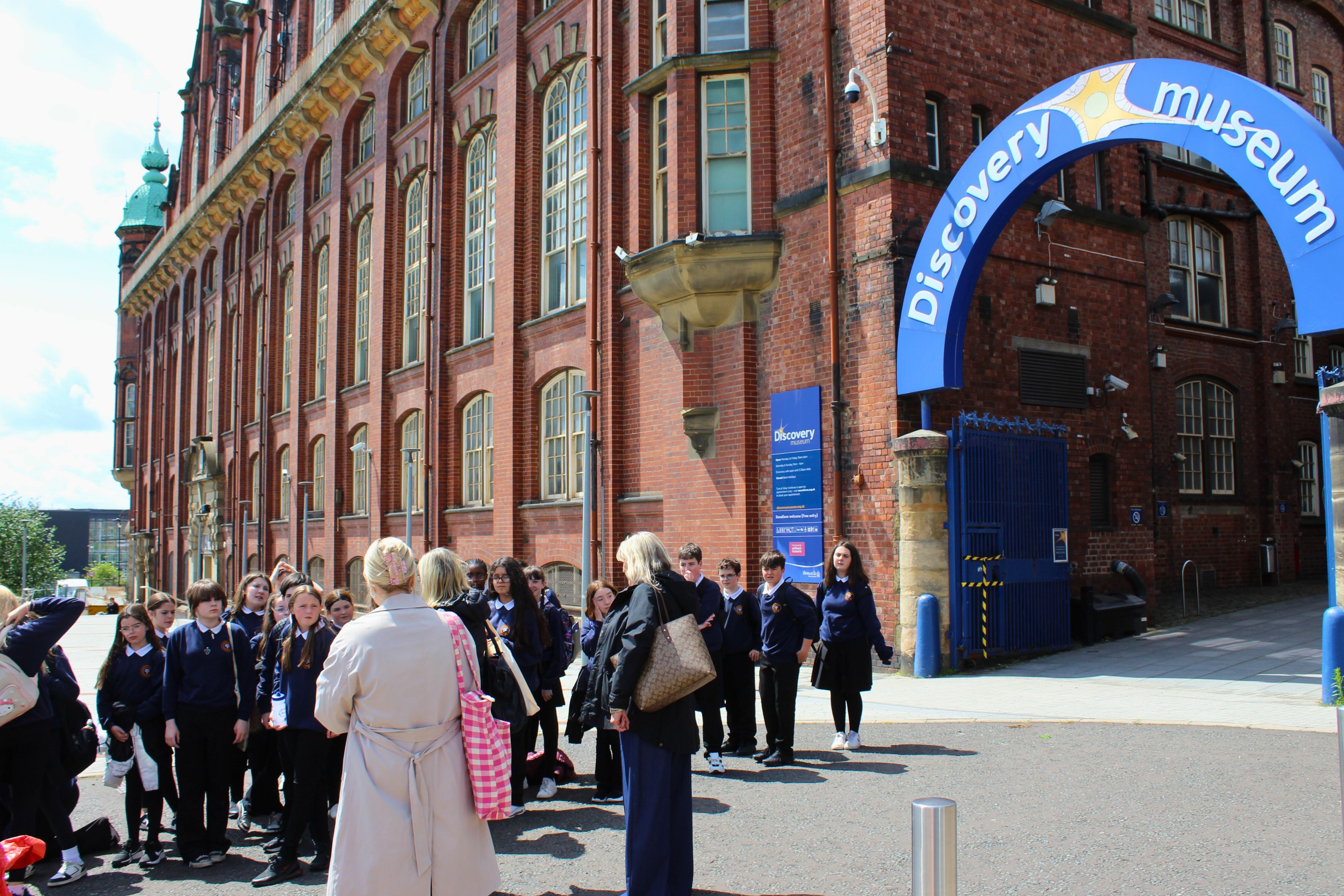 A group of students outside the Discovery Museum in Newcastle