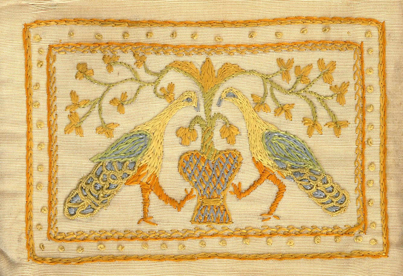 Embroidery art of two birds on a small pouch that contained the poems of Mary Coleridge, Miscellaneous Manuscripts, Misc MSS. 56