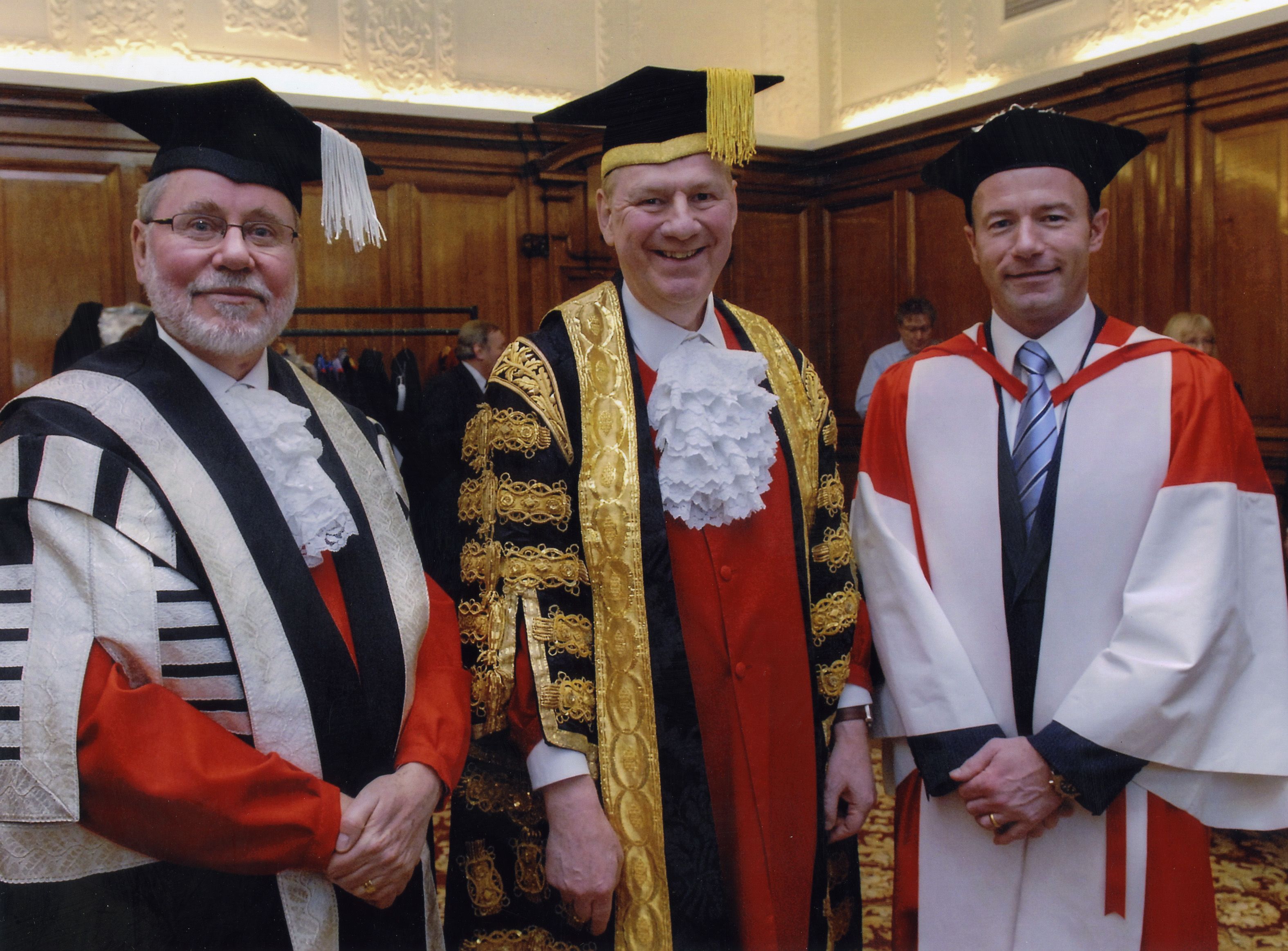Photograph of Sir Liam (middle) is pictured with Professor Chris Brink, Vice-Chancellor of Newcastle University, and footballer Alan Shearer, who was conferred with an honorary degree at the same ceremony, 2009. Sir Liam Donaldson Archive, LD/5/1/7.