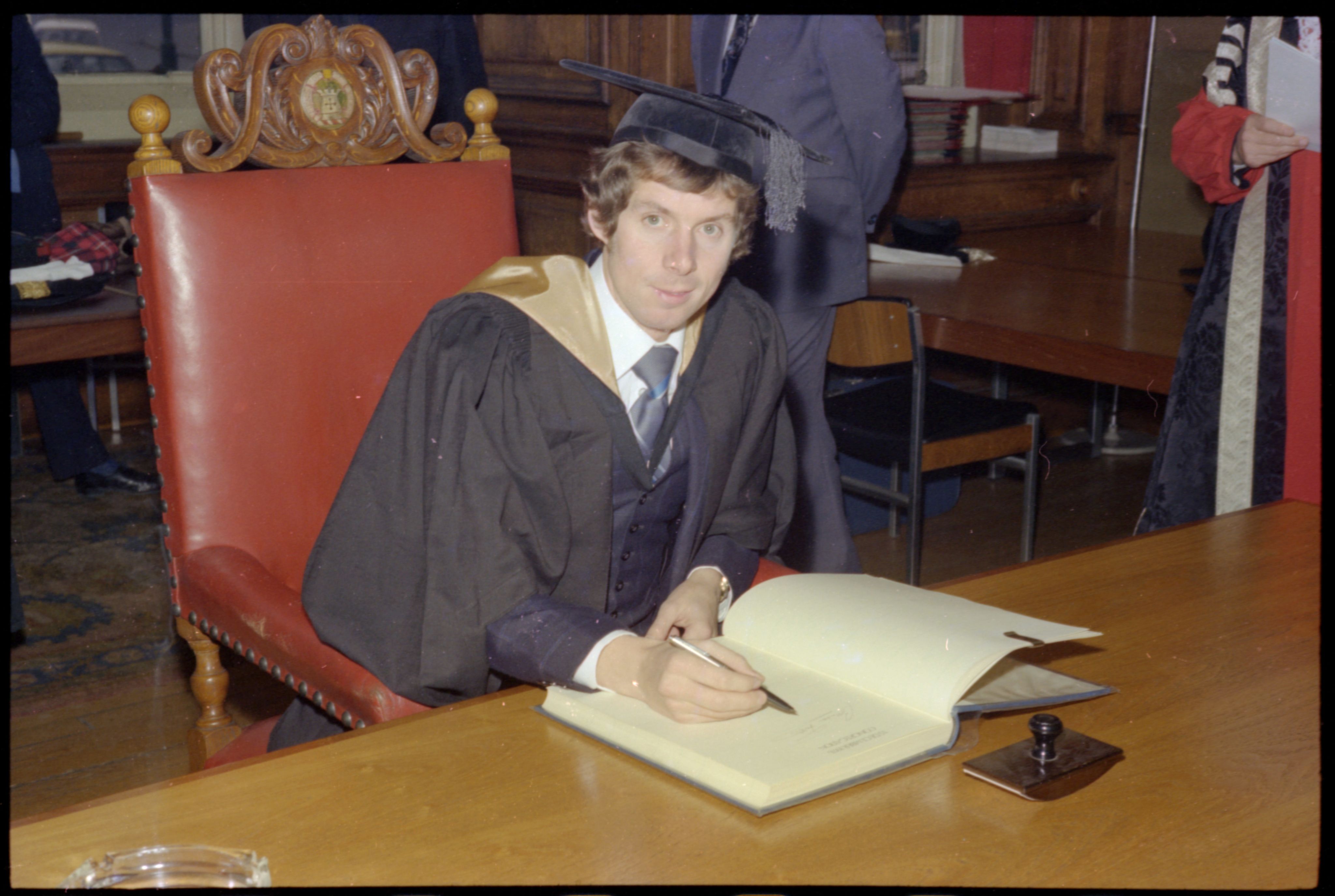 Photograph of Brendan Foster (won an Olympic bronze medal at 1976 Olympic Games) receives honorary degree. NUA/C/113870/32.