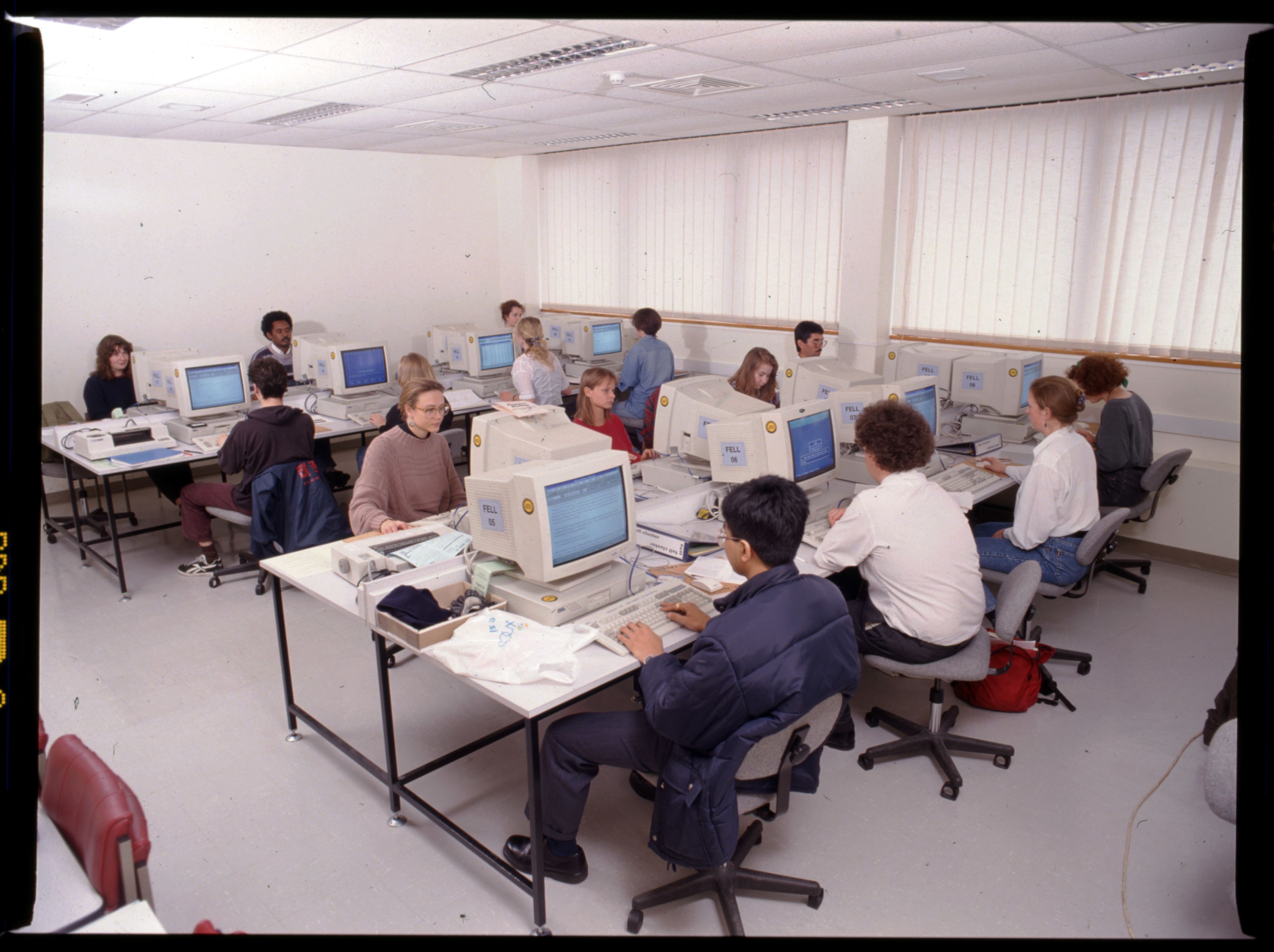 Photograph of students studying at newly installed PCs in the Fell Cluster, 1994. NUA/273412/01.