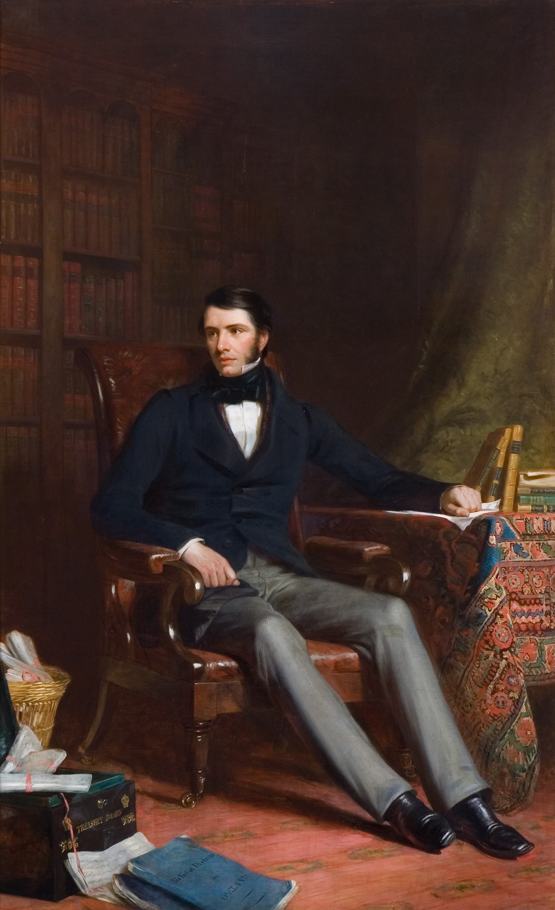 Portrait of Sir Charles Edward Trevelyan as a young man, seated, looking to the right, in a formal suit