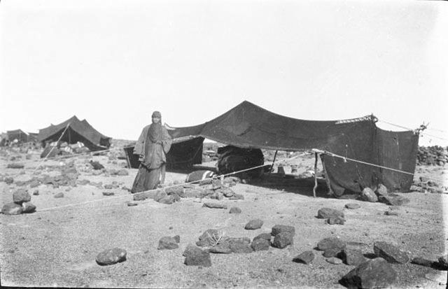 Photograph of Serdiyyeh woman outside a tent.
